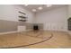 Indoor basketball court with polished wood floors and ample space, great for recreational activities at 4356 Ashton Club Dr, Lake Wales, FL 33859