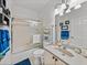 Bathroom with a shower, bathtub, and sink with ample counter space at 4356 Ashton Club Dr, Lake Wales, FL 33859