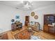 Bedroom features ceiling fan, desk, area rug, sofa, bookcases, and decor at 4356 Ashton Club Dr, Lake Wales, FL 33859