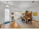 Bright dining room with hardwood floors, a chandelier, and a vintage wooden hutch at 4356 Ashton Club Dr, Lake Wales, FL 33859