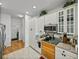 Well-lit kitchen featuring modern appliances, stylish countertops, and ample storage space at 4356 Ashton Club Dr, Lake Wales, FL 33859