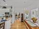 Bright kitchen with stainless steel appliances, breakfast bar, and a view of the dining and living areas at 4356 Ashton Club Dr, Lake Wales, FL 33859