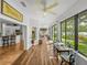 Open-concept design with multiple living areas and large windows providing natural light and tranquil views at 4356 Ashton Club Dr, Lake Wales, FL 33859