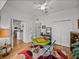 A versatile area showcasing a game table, cozy seating, and ample storage at 4356 Ashton Club Dr, Lake Wales, FL 33859