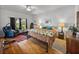 Comfortable main bedroom featuring hardwood floors, natural light, and tasteful decor at 4356 Ashton Club Dr, Lake Wales, FL 33859