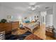 Spacious main bedroom with hardwood floors, ceiling fan, and tasteful decor at 4356 Ashton Club Dr, Lake Wales, FL 33859