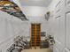 Spacious walk-in closet with built-in shelves and ample storage for all your wardrobe needs at 4356 Ashton Club Dr, Lake Wales, FL 33859