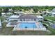 The community pool and recreational area, viewed from above, with lawn furniture at 4941 Foxdale Dr, Lakeland, FL 33810