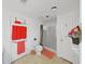 Bathroom featuring a walk-in shower and decorative towels at 4941 Foxdale Dr, Lakeland, FL 33810