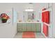 Bathroom with dual sinks, decorative towels, and updated fixtures at 4941 Foxdale Dr, Lakeland, FL 33810