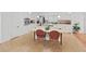 Bright kitchen features a large island with seating, white cabinetry, and modern appliances at 4941 Foxdale Dr, Lakeland, FL 33810