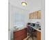 Home office features lots of natural light and built-in storage at 4941 Foxdale Dr, Lakeland, FL 33810