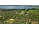 Expansive property features lush forest and pond; outlined to show boundaries at 4949 Lake Kotsa Dr, Lake Wales, FL 33898