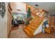 Spacious entryway with staircase, living room, and decorative touches to welcome guests at 4949 Lake Kotsa Dr, Lake Wales, FL 33898