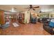 Spacious living area featuring wood-look floors and an open floor plan at 4949 Lake Kotsa Dr, Lake Wales, FL 33898