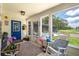 The sunroom overlooks the pool and backyard with abundant windows and natural light at 4949 Lake Kotsa Dr, Lake Wales, FL 33898