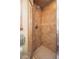 Step into a shower with custom tile work and a glass door for a spa-like experience at 4949 Lake Kotsa Dr, Lake Wales, FL 33898
