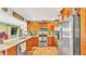Spacious kitchen with lots of wood cabinets and stainless steel appliances at 527 Duchess Dr, Lakeland, FL 33803