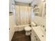 Cozy bathroom featuring a shower-tub combination, white tiling, and modern fixtures at 550 E Thelma St, Lake Alfred, FL 33850