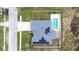 Overhead view of home showing backyard, pool, solar panels, and more at 607 S 16Th St, Haines City, FL 33844