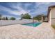 Backyard showcasing a stunning pool with a large patio and pergola for outdoor entertaining at 607 S 16Th St, Haines City, FL 33844