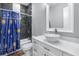 Nicely decorated bathroom featuring a rain shower head, new vanity and modern tiling at 607 S 16Th St, Haines City, FL 33844