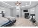 Spacious bedroom with ceiling fan and ensuite access to an office and kitchen at 607 S 16Th St, Haines City, FL 33844