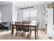 Dining area with a wood table, chairs, and bright natural light at 607 S 16Th St, Haines City, FL 33844