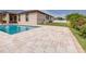 Backyard pool featuring a modern patio, perfect for relaxing and entertaining at 607 S 16Th St, Haines City, FL 33844