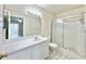 Clean, bright bathroom featuring a large vanity with a modern sink and a glass-enclosed shower at 615 Ridge Ter # 615, Winter Haven, FL 33881