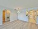 Dining area with hardwood floors, open to the kitchen and bathroom at 615 Ridge Ter # 615, Winter Haven, FL 33881