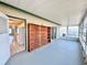Florida room with sliding glass windows, and access to the kitchen at 615 Ridge Ter # 615, Winter Haven, FL 33881