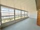 Enclosed lanai featuring large screened windows and a bright interior at 615 Ridge Ter # 615, Winter Haven, FL 33881