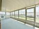 Enclosed lanai with large screened windows providing an abundance of natural light at 615 Ridge Ter # 615, Winter Haven, FL 33881