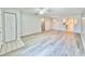 Spacious living room features hardwood floors, open floor plan, and abundant natural light at 615 Ridge Ter # 615, Winter Haven, FL 33881