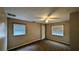 Empty bedroom featuring a ceiling fan and natural light at 624 N Lanier Ave, Fort Meade, FL 33841