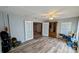 Bright bonus room with wood-look floors at 624 N Lanier Ave, Fort Meade, FL 33841