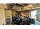 Spacious garage featuring ample storage, a variety of equipment, and a well-organized layout at 624 N Lanier Ave, Fort Meade, FL 33841