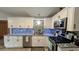 Modern kitchen boasting granite countertops, stainless steel appliances, and ample cabinet space at 624 N Lanier Ave, Fort Meade, FL 33841