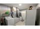 Spacious laundry room offers ample storage and is equipped with washer and dryer hookups at 624 N Lanier Ave, Fort Meade, FL 33841