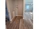 Laundry area with washer hookups and view into the living area with natural light at 631 Julia Se St, Winter Haven, FL 33880