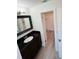 This bathroom features granite countertop at 655 E Sanford St, Lake Alfred, FL 33850