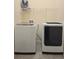 Laundry room featuring a modern washer and dryer set at 830 Cabaret Ct, Kissimmee, FL 34759