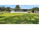 Spacious backyard with lush green grass at 8314 W Lake Marion Rd, Haines City, FL 33844