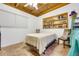Cozy bedroom features a built-in bookshelf and a unique wooden ceiling at 8314 W Lake Marion Rd, Haines City, FL 33844