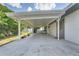 Attached carport featuring a covered patio area at 8314 W Lake Marion Rd, Haines City, FL 33844