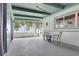 Screened-in patio offers serene views and ample space for outdoor seating at 8314 W Lake Marion Rd, Haines City, FL 33844