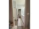 Well-lit bathroom with a long vanity, white cabinets, and neutral decor creating a clean and inviting space at 832 Vienna Dr, Winter Haven, FL 33884