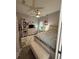 Comfortable bedroom with a large bed, dresser, and bench with light and neutral tones throughout at 832 Vienna Dr, Winter Haven, FL 33884