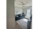 Inviting bonus room featuring a comfortable couch, natural light, and stylish decor at 832 Vienna Dr, Winter Haven, FL 33884